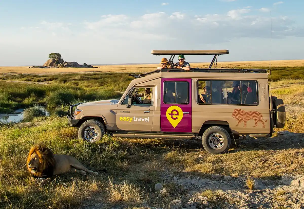 Safari vehicle in the prairies June