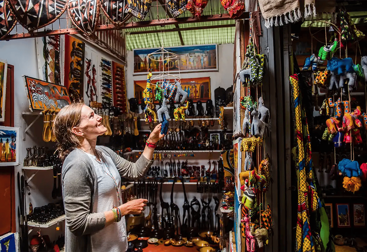 Woman buying handicrafts March