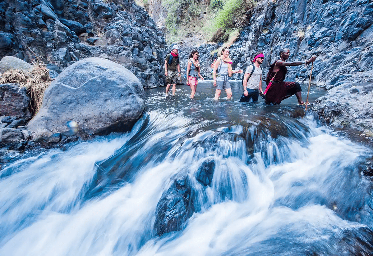 People crossing a river October