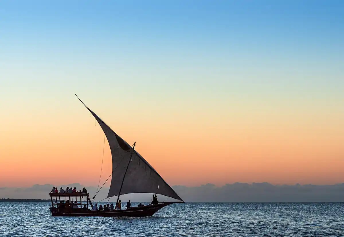 Sail boat at the sea on a sunset August