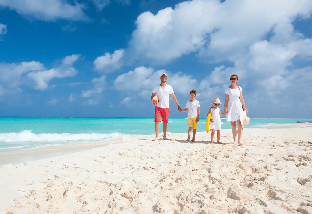 Family walking at the beach December